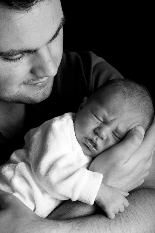 male father with newborn male child paternity test